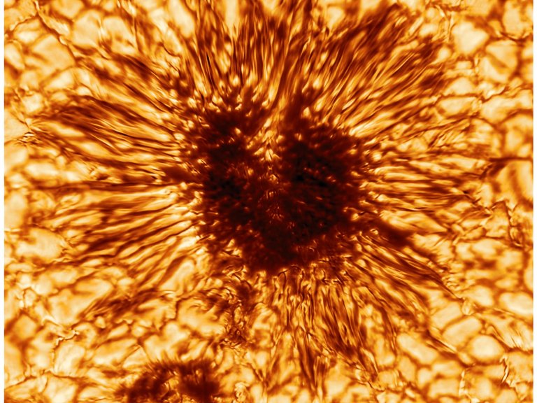 A reconstruction of the sunspot  captured by the Daniel K. Inouye Solar Telescope on January 28th, 2020. The original image was taken in the wavelength of 530 nanometers - in the greenish-yellow part of the visible spectrum–. Researchers modified it to show up red and orange to the naked eye