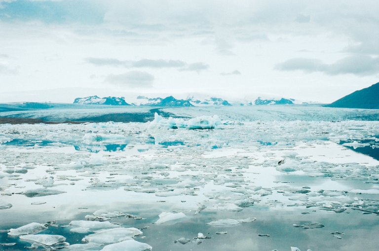 cold ocean waters with chunks of ice