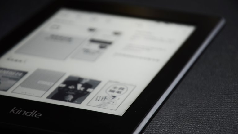 Kindle e-reader on store home screen.