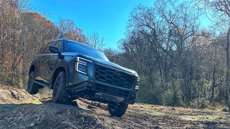 an SUV rides off road on dirt