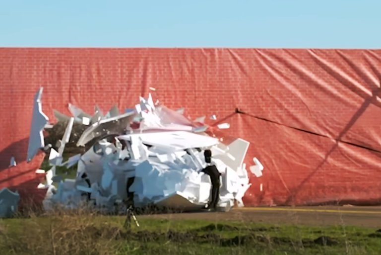 car running through foam wall