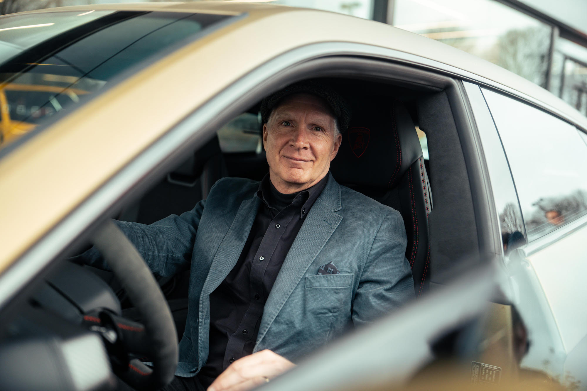 man in car